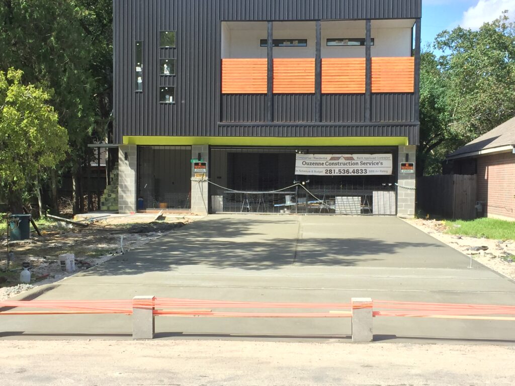 A garage with a ramp in front of it.