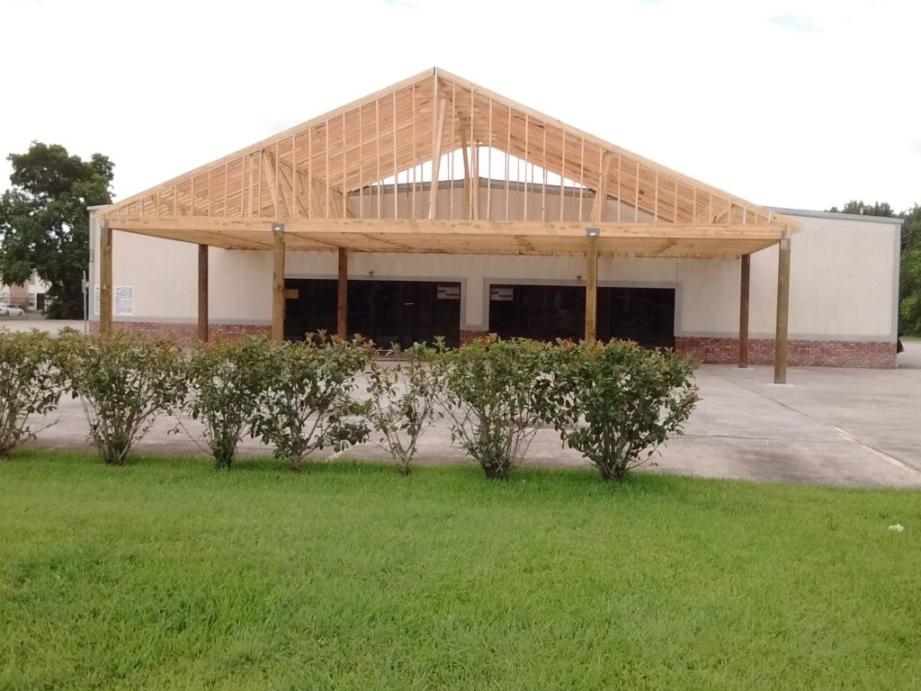 A building with a roof that has been built.